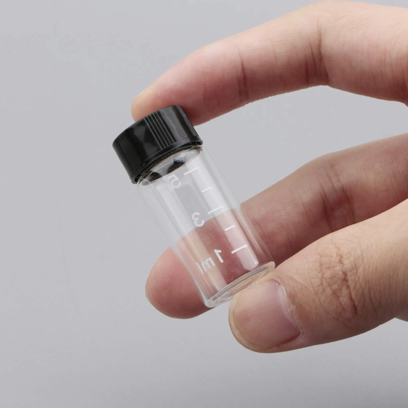 Flaconi di vetro trasparenti da 5ml con tappo a vite graduato per viaggio